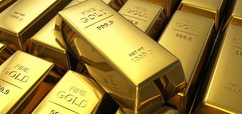 El oro brilla como activo refugio y toca los 1.500 dólares